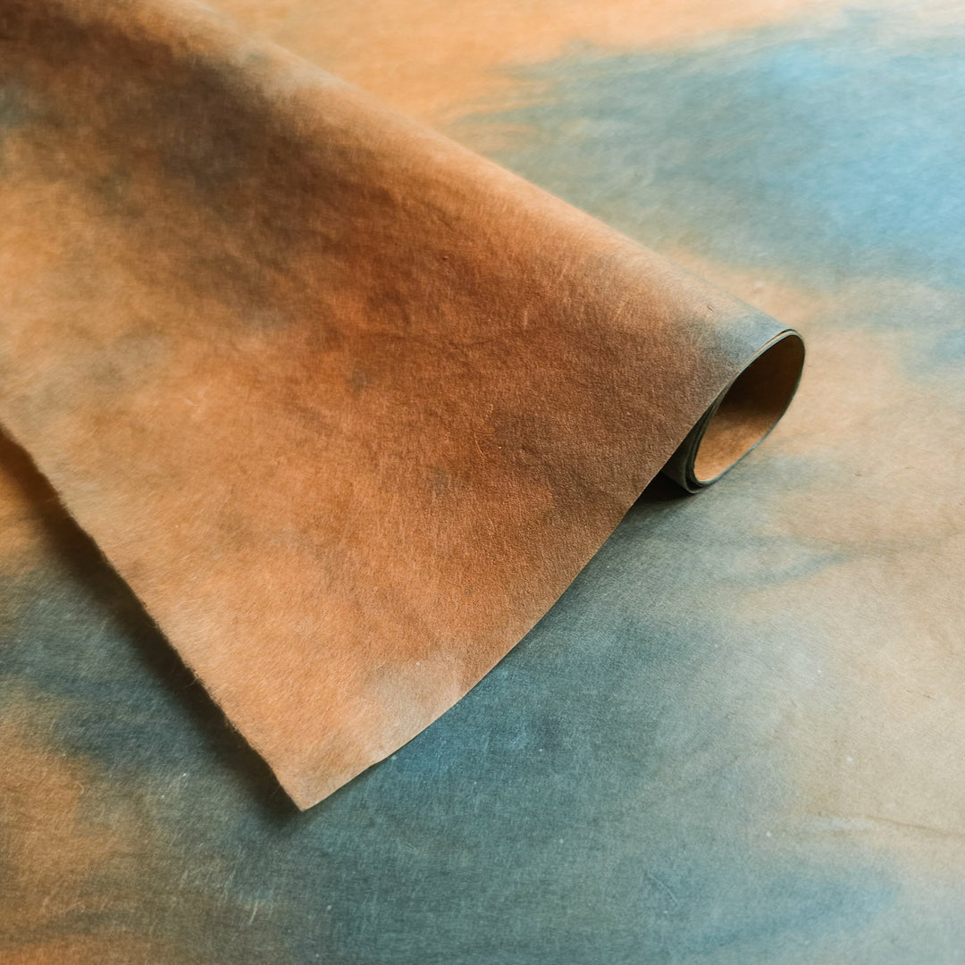 Beautifully hand-colored mulberry paper by Kozo Studio with abstract green and brown ombre tones, perfect for scrapbooking, décor, and more.
