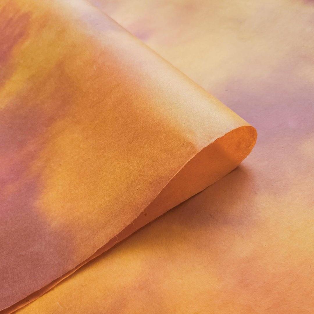 Warm-toned Ombre Kozo Paper sheet in Amber Dawn, a high-quality handmade mulberry paper from Kozo Studio known for its smooth texture and artistic gradient.