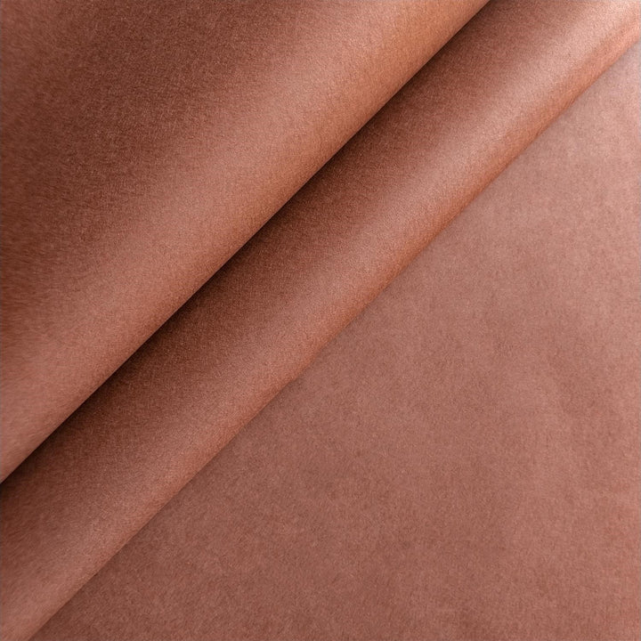 Close-up view of solid-colored mulberry paper in amber brown by Kozo Studio, featuring smooth handmade paper texture and minimalist design.