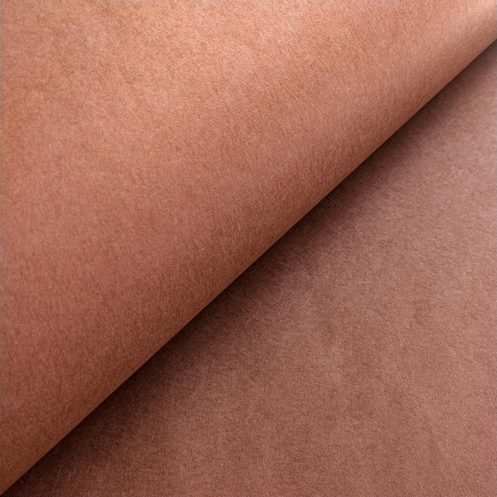 High-quality close-up of Kozo Studio handmade paper in amber brown, featuring smooth mulberry paper with warm earthy elegance.