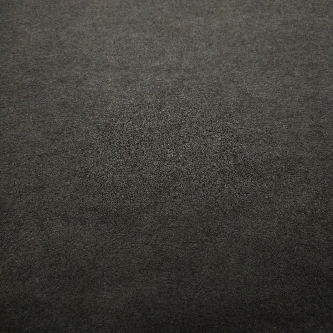Kozo Studio black mulberry paper in a close-up view featuring the soft texture and organic folds of handmade paper.