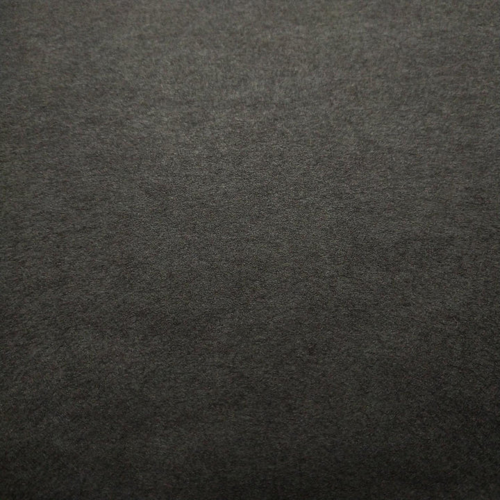 Kozo Studio black mulberry paper in a close-up view featuring the soft texture and organic folds of handmade paper.