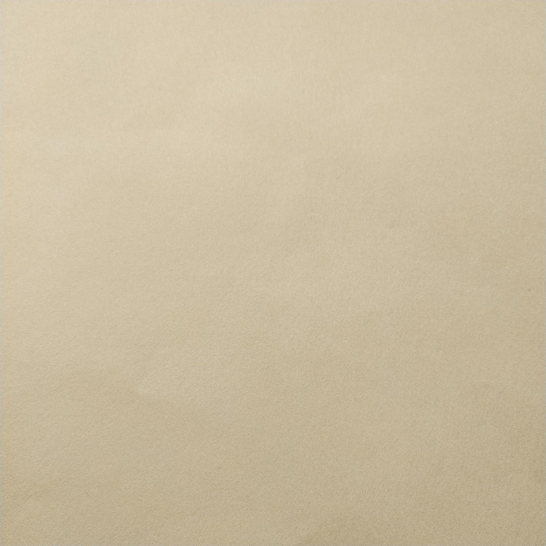 Ivory-colored handmade paper sheets by Kozo Studio overlapping with soft folds and natural texture typical of mulberry paper.
