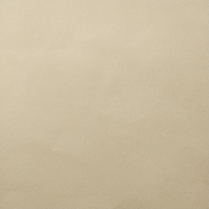 Ivory-colored handmade paper sheets by Kozo Studio overlapping with soft folds and natural texture typical of mulberry paper.
