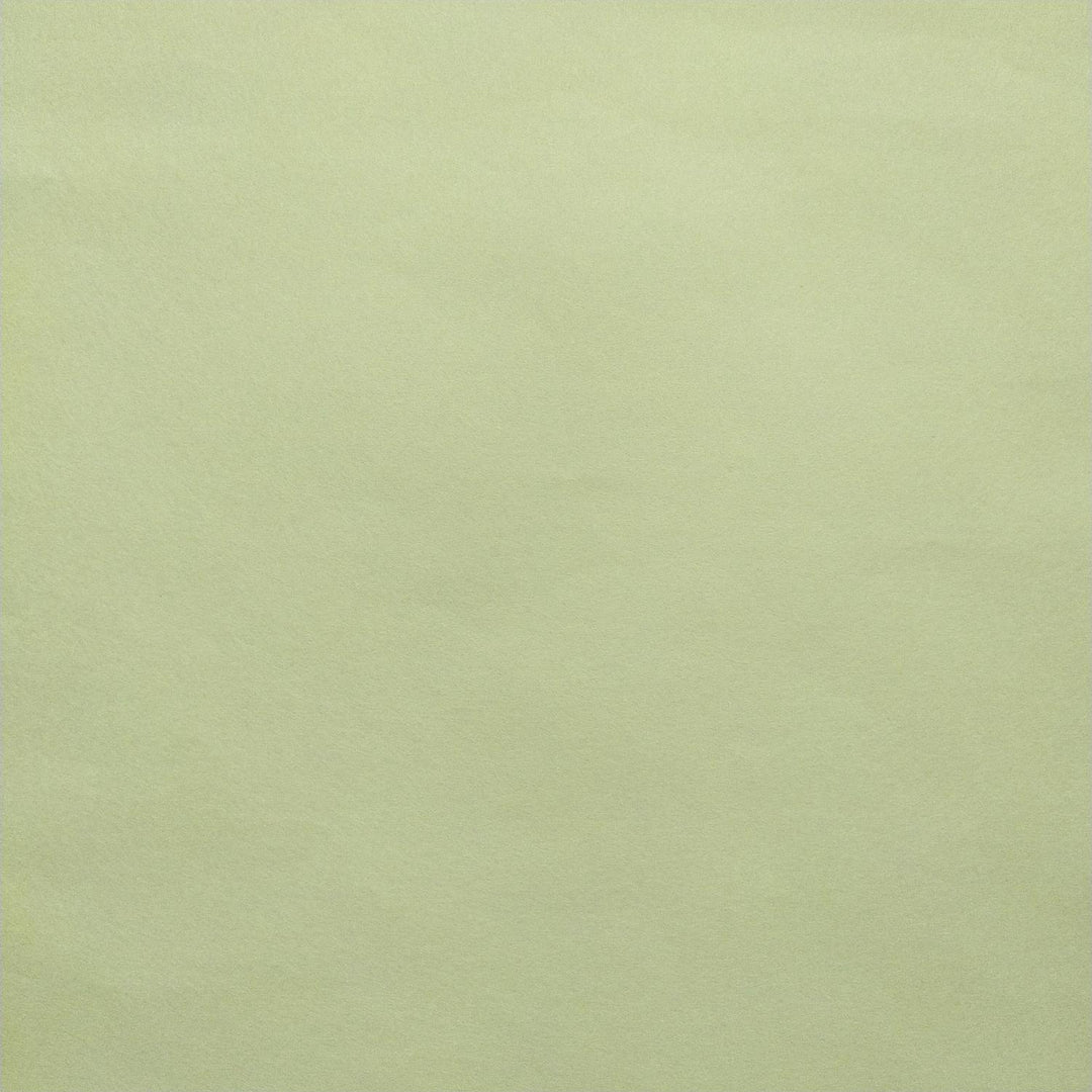 Lemon yellow paper from Kozo Studio, featuring soft mulberry fibers and a light-catching smooth surface.