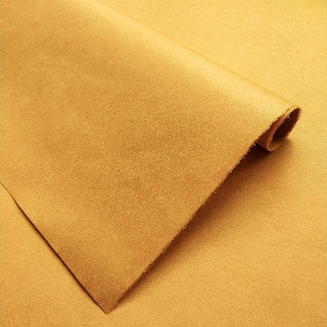 Detailed view of solid-colored Nugget Kozo paper, highlighting the smooth surface and layered depth of this handcrafted mulberry paper from Kozo Studio