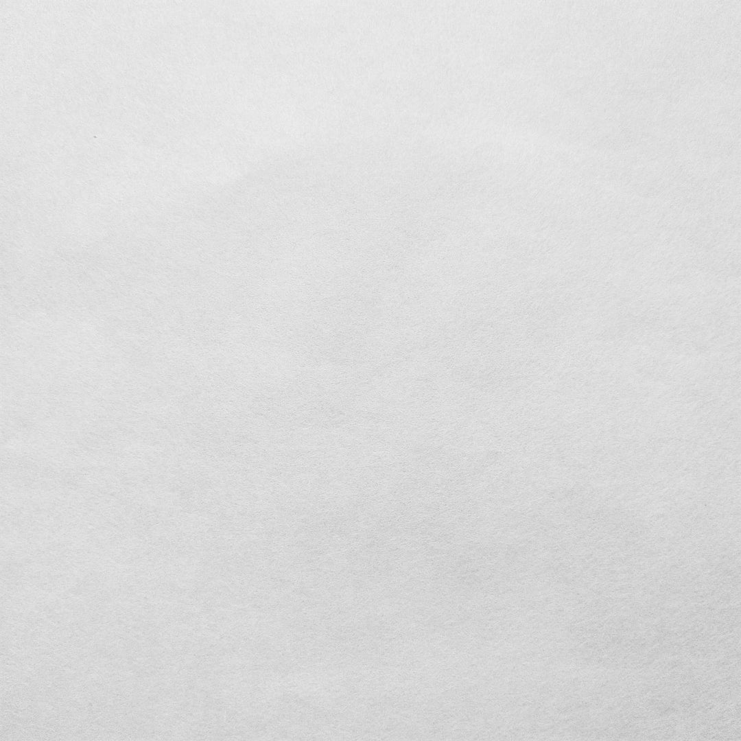 Kozo Studio white mulberry paper close-up showing the refined handmade surface and delicate kozo texture.