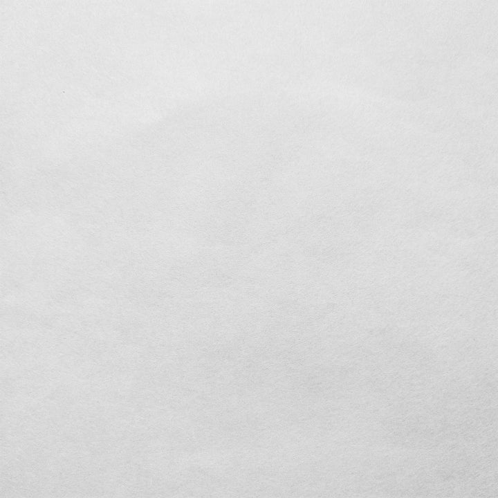 Kozo Studio white mulberry paper close-up showing the refined handmade surface and delicate kozo texture.