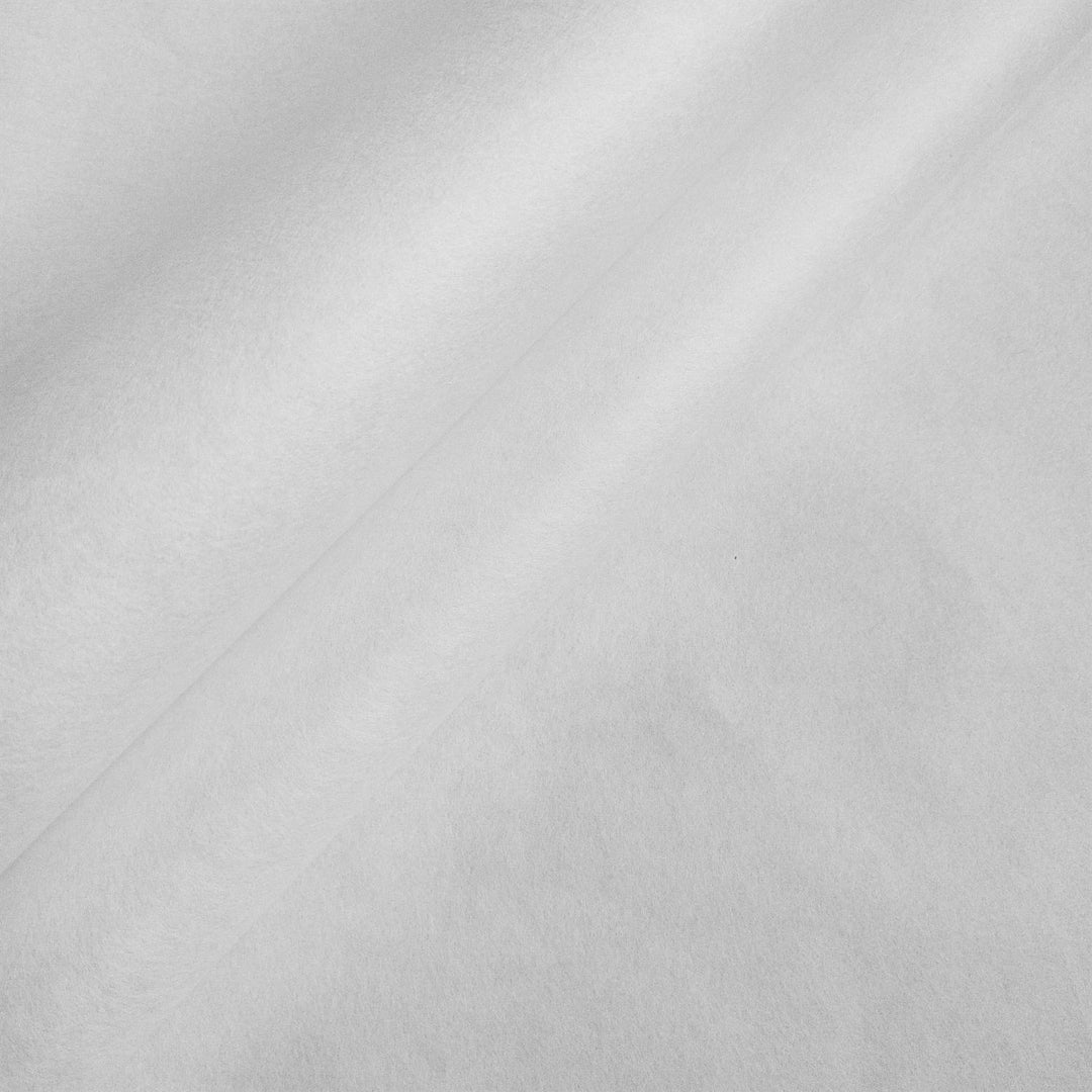 Close-up view of solid white mulberry paper by Kozo Studio showing smooth handmade texture with natural kozo fibers.