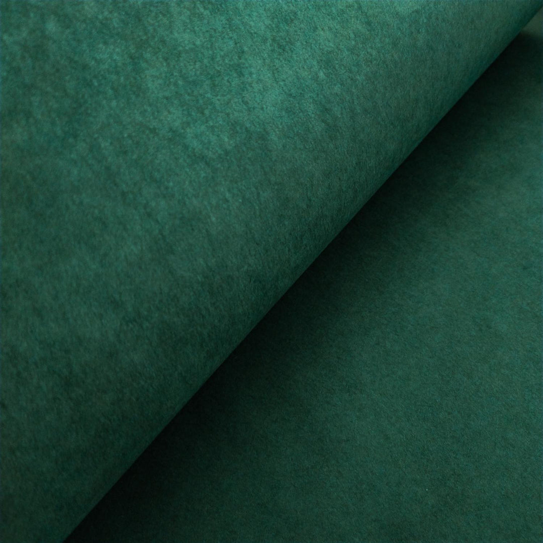 Kozo Studio Amazon Green mulberry paper close-up, emphasizing the natural look and feel of handmade paper.