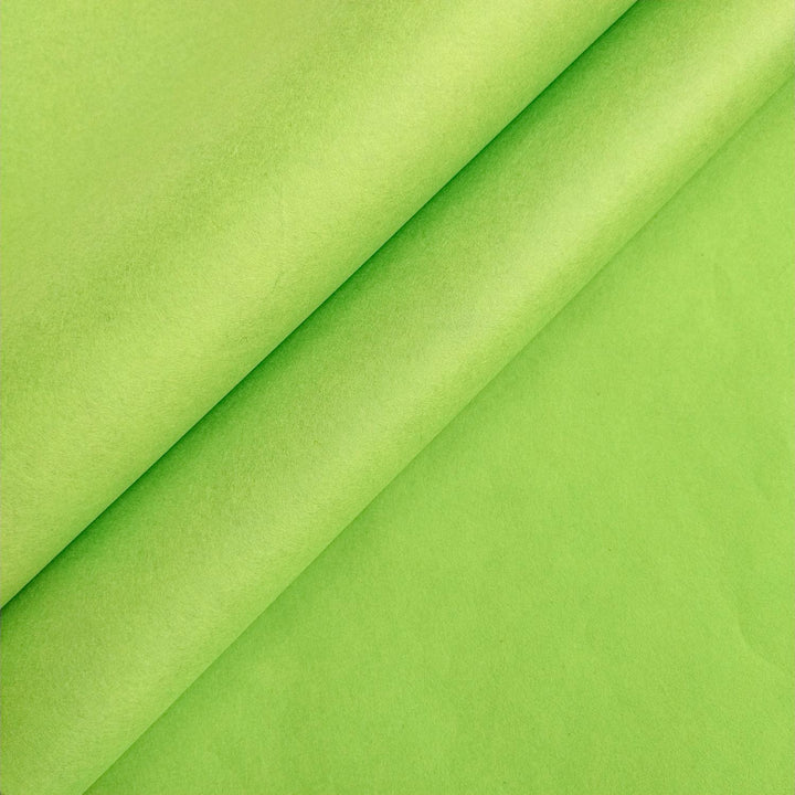 Close-up of olive green mulberry paper by Kozo Studio, showcasing the soft texture and smooth surface of premium handmade paper.