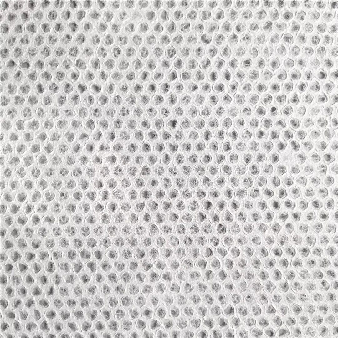 Handcrafted Lace Kozo Paper Sheets with Mini Dot Design – Mulberry paper created frame by frame at Kozo Studio using a unique handmade paper process that enhances translucency and detail.