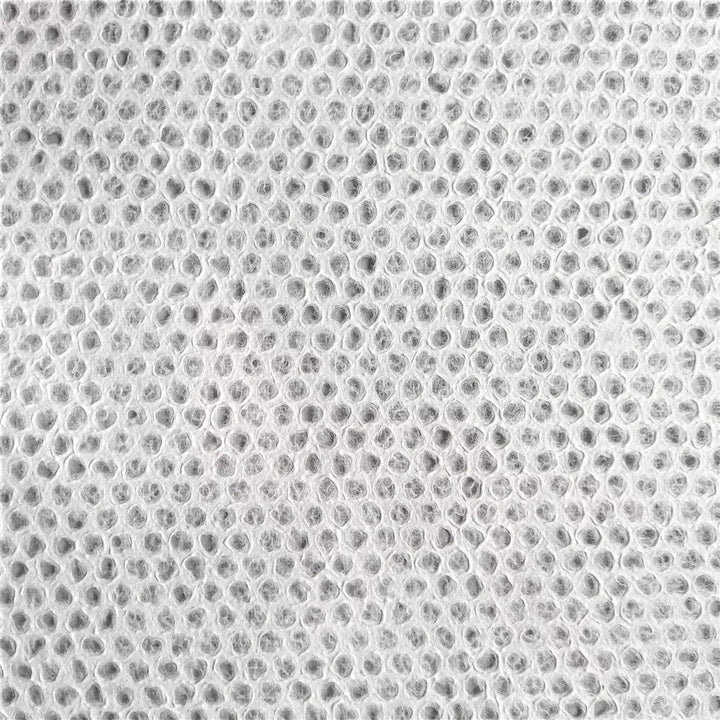 Handcrafted Lace Kozo Paper Sheets with Mini Dot Design – Mulberry paper created frame by frame at Kozo Studio using a unique handmade paper process that enhances translucency and detail.