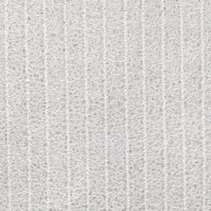 Detail of artisanal lace mulberry paper from Kozo Studio, with translucent qualities ideal for creative projects such as lampshades or window decor, crafted through traditional Rakusui technique.