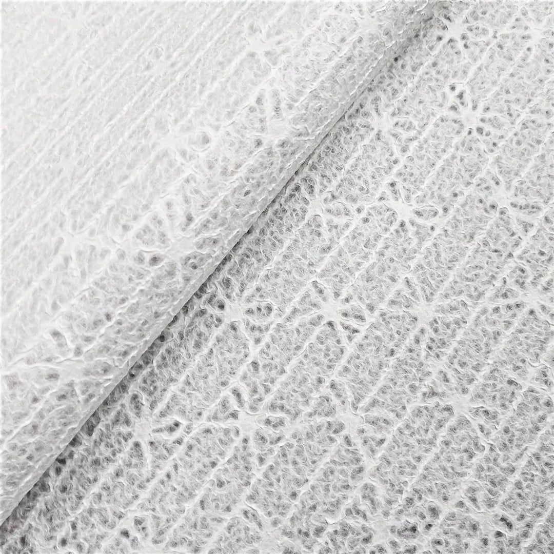 Kozo Studio handmade paper made from mulberry with delicate lace bow details, versatile for window treatments and crafts