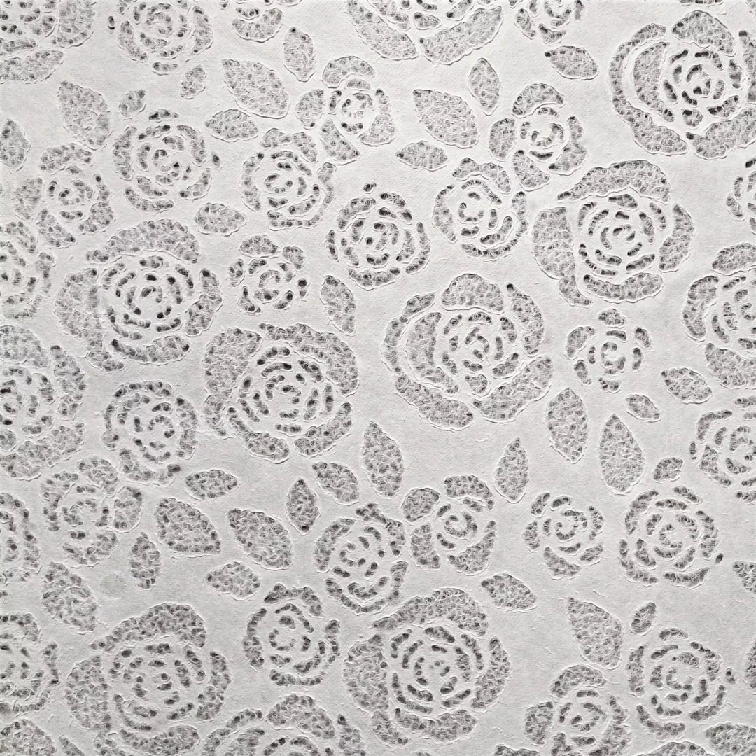 Kozo Studio mulberry paper featuring soft, lace-inspired floral designs, ideal for decorative crafts, fashion accents, and light-filtering home décor.