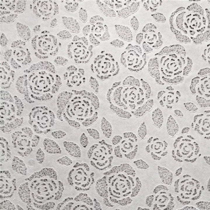 Kozo Studio mulberry paper featuring soft, lace-inspired floral designs, ideal for decorative crafts, fashion accents, and light-filtering home décor.