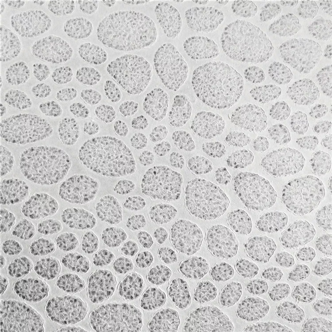 Kozo Studio's handmade lace kozo paper with stone pattern, showcasing fine details and delicate texture, perfect for craftwork and decorative window designs.