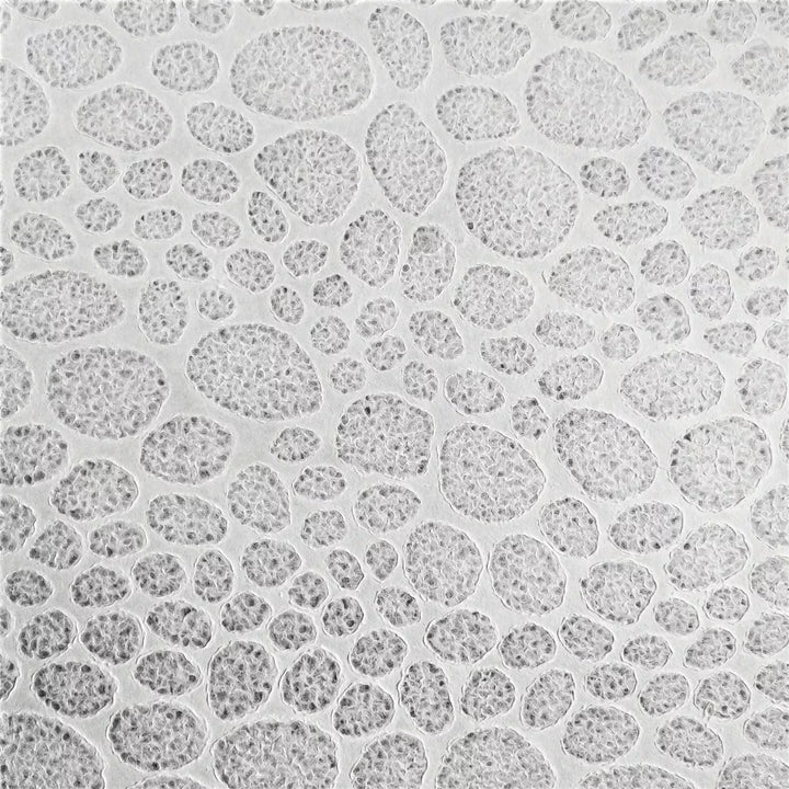 Kozo Studio's handmade lace kozo paper with stone pattern, showcasing fine details and delicate texture, perfect for craftwork and decorative window designs.