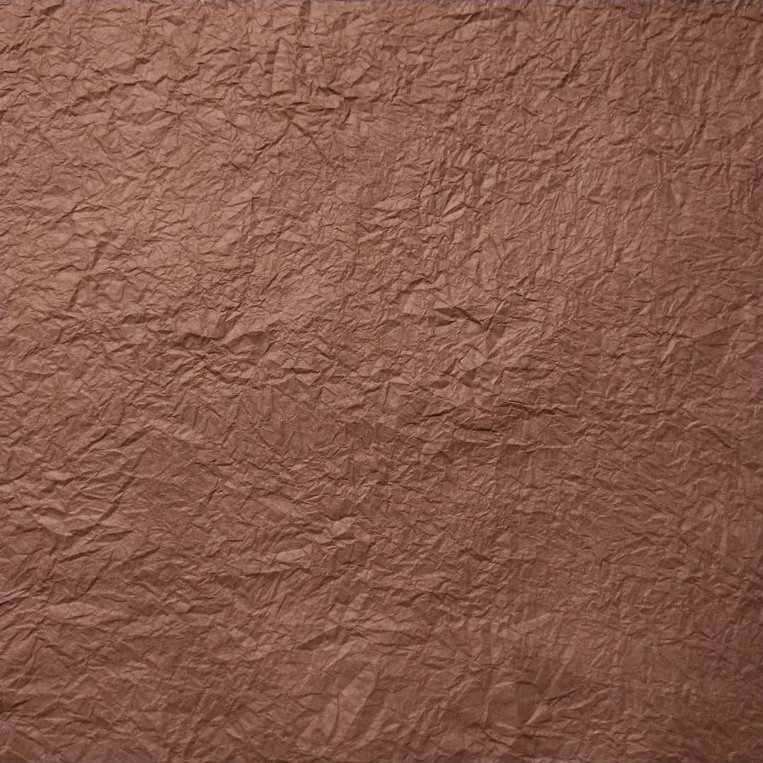 Kozo Studio handmade Momigami paper in earthy brown, showcasing textured mulberry paper ideal for creative applications like bookbinding and decor.