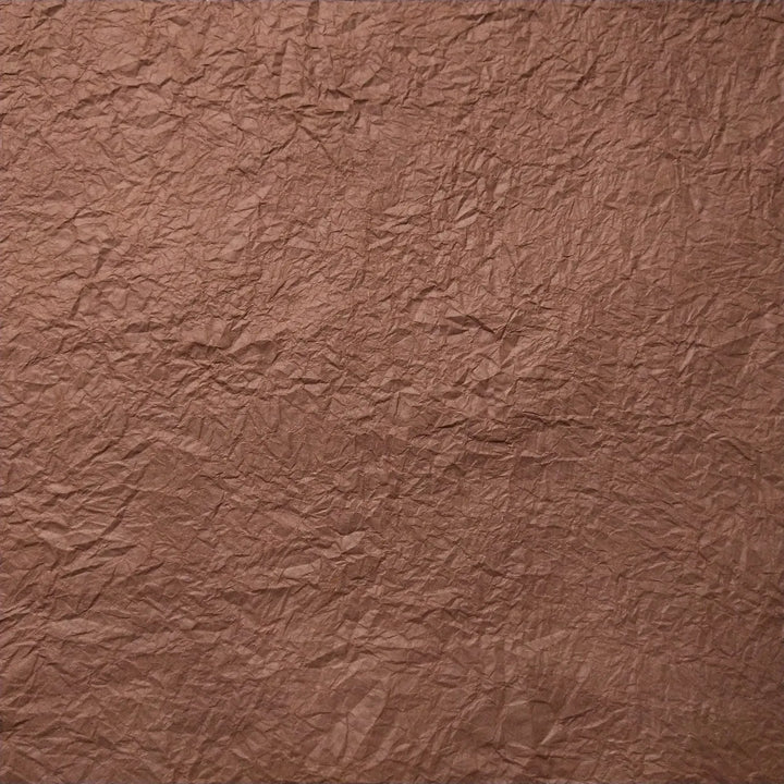 Kozo Studio handmade Momigami paper in earthy brown, showcasing textured mulberry paper ideal for creative applications like bookbinding and decor.