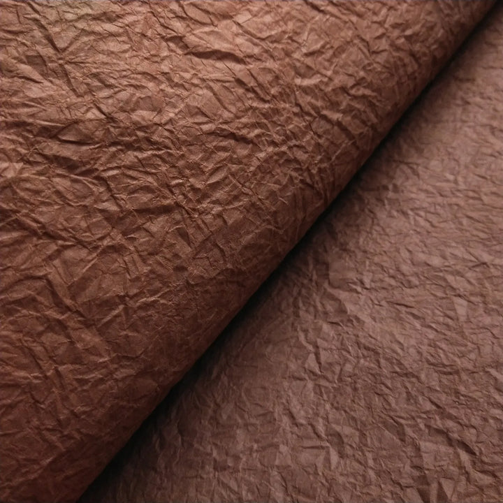 Brown Momigami mulberry paper from Kozo Studio, a richly textured handmade paper suited for gift wrapping, paper art, and home decor.
