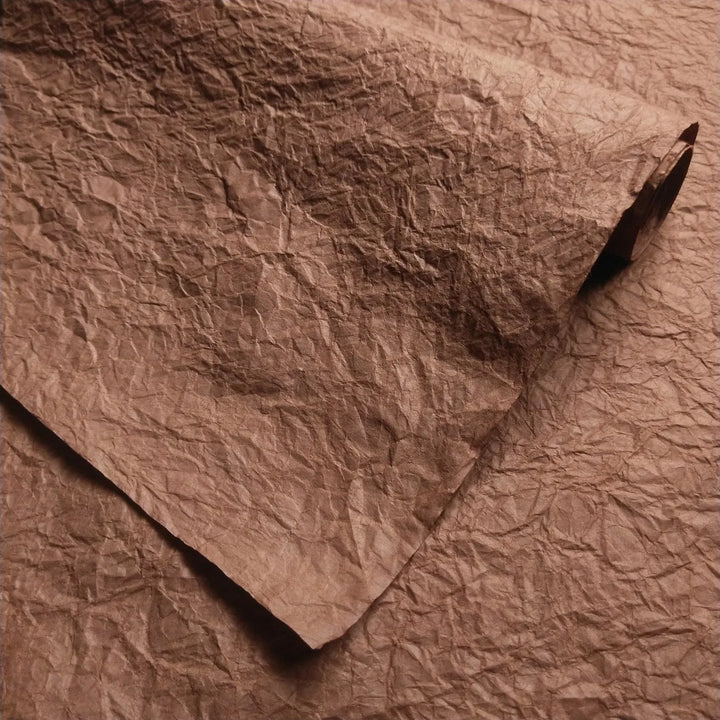 Artisan Momigami handmade paper in brown, crafted by Kozo Studio with traditional mulberry paper techniques for versatile crafting uses.