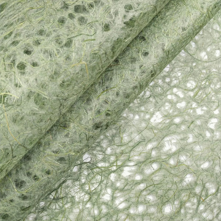 Kozo Studio Asarakusui Lace Paper in Moss shown in a close-up revealing layered mulberry fibers and the delicate pattern of this handmade paper.