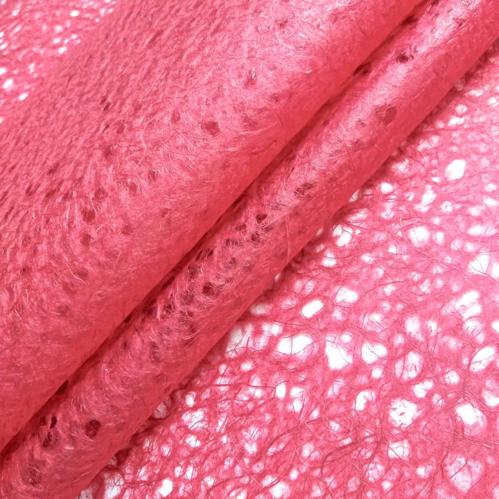 High-resolution image of red mulberry lace paper crafted by Kozo Studio, featuring a rich handmade texture with visible fiber patterns and depth.