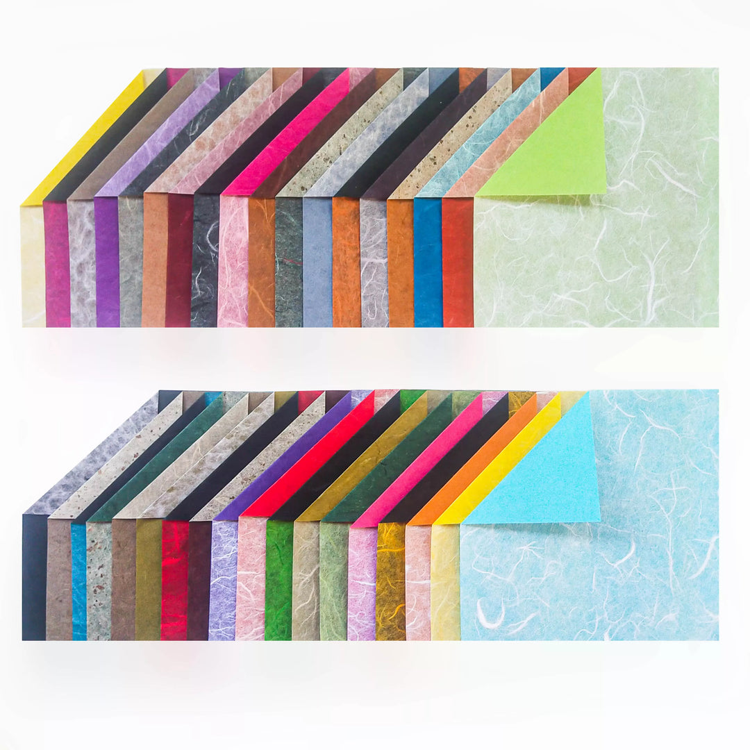The Origami Duo Kozo Paper Pack by Kozo Studio features 36 vibrant, textured 6x6-inch sheets in greens, blues, reds, and neutrals. Each sheet boasts a unique color and fibrous texture of handmade mulberry and rice paper.