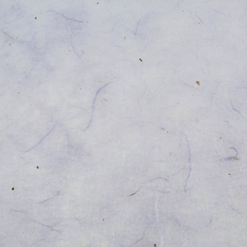 A close-up reveals a textured surface of Water-resistant Kozo Paper (Lavender) by Kozo Studio, with faint lines and small specks, reminiscent of fibers or hair on a light, neutral background, akin to the delicate weave of mulberry paper.