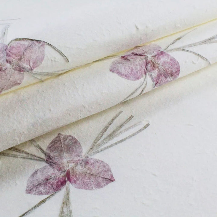 Kozo Studio mulberry paper featuring a subtle floral design with thin stems and a textured handmade paper surface.