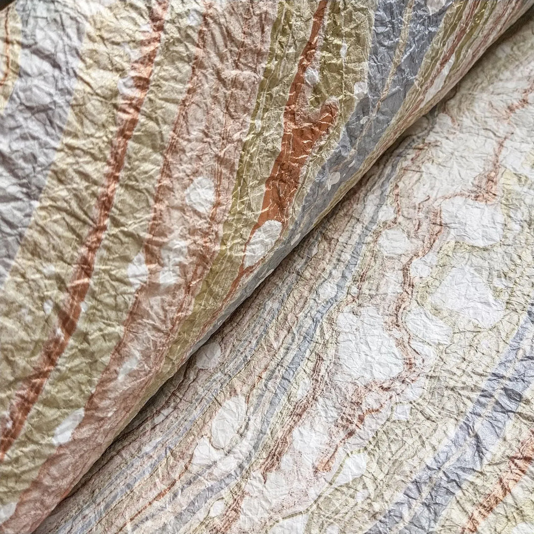 High-quality photo of Milano Kozo Paper – Design 10 from Kozo Studio, a luxurious handmade paper featuring mulberry fibers, artistic marbling, and a crinkled surface ideal for crafts or decor.
