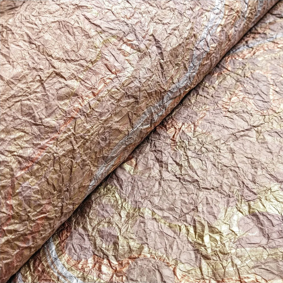 Decorative taupe handmade paper from Kozo Studio, made with traditional mulberry paper marbling techniques that create one-of-a-kind visual patterns.
