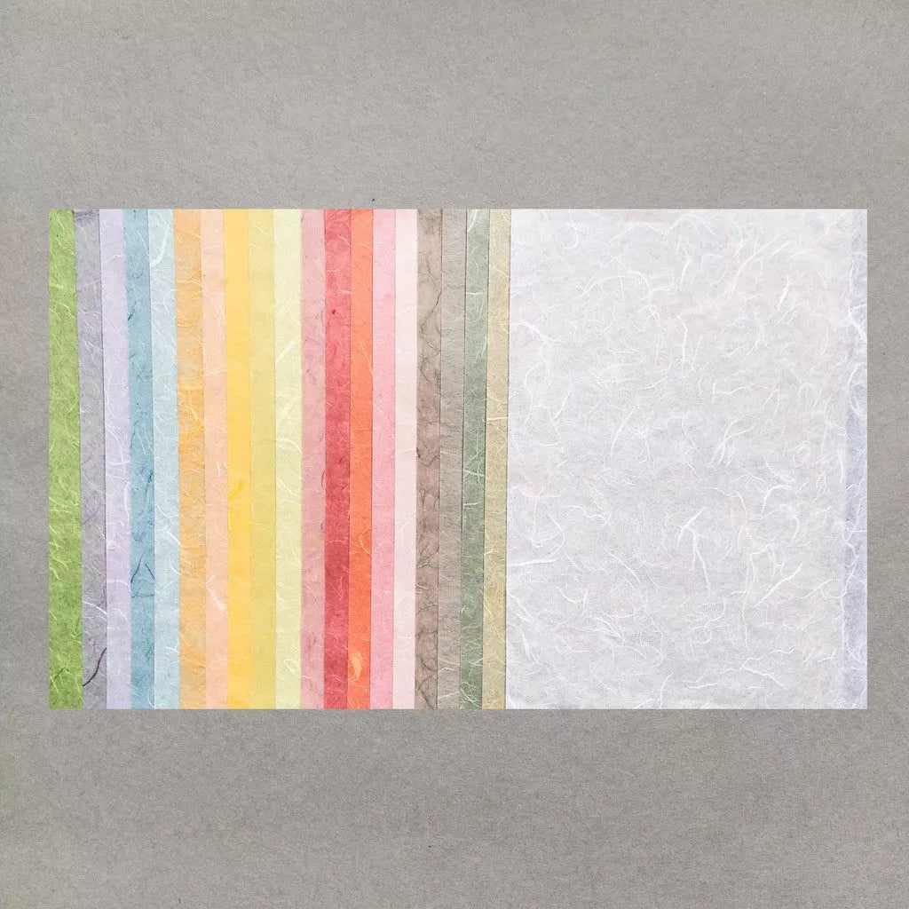 Kozo Studios Assorted A4 Pastel Unryu Kozo Paper Set features vertically arranged pastel colors, including green, yellow, pink, and orange mulberry papers.