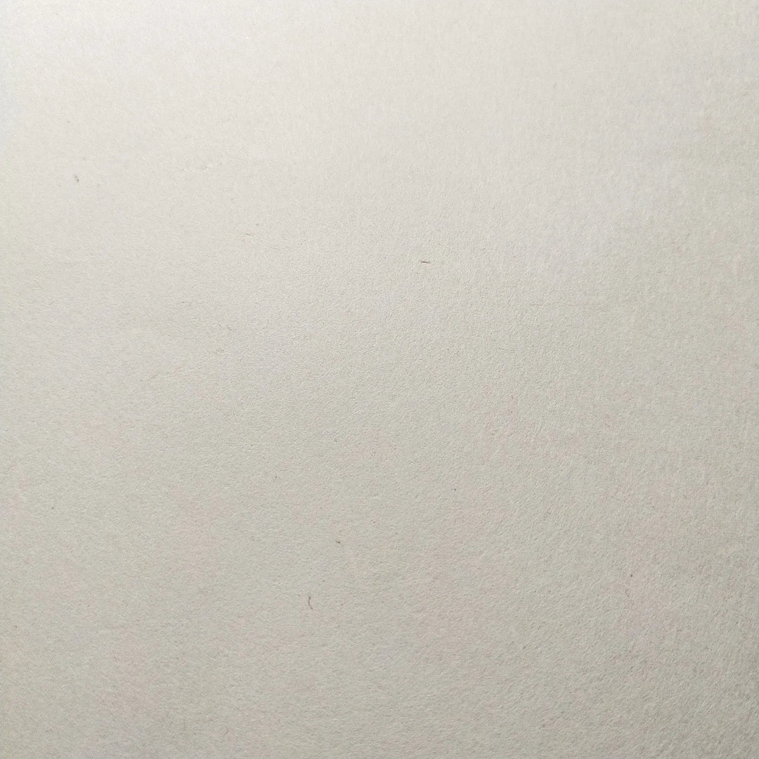 Detailed view of unbleached, thin handmade paper from Kozo Studio, crafted from fine mulberry fibers and perfect for digital printing, drawing, and bookbinding.