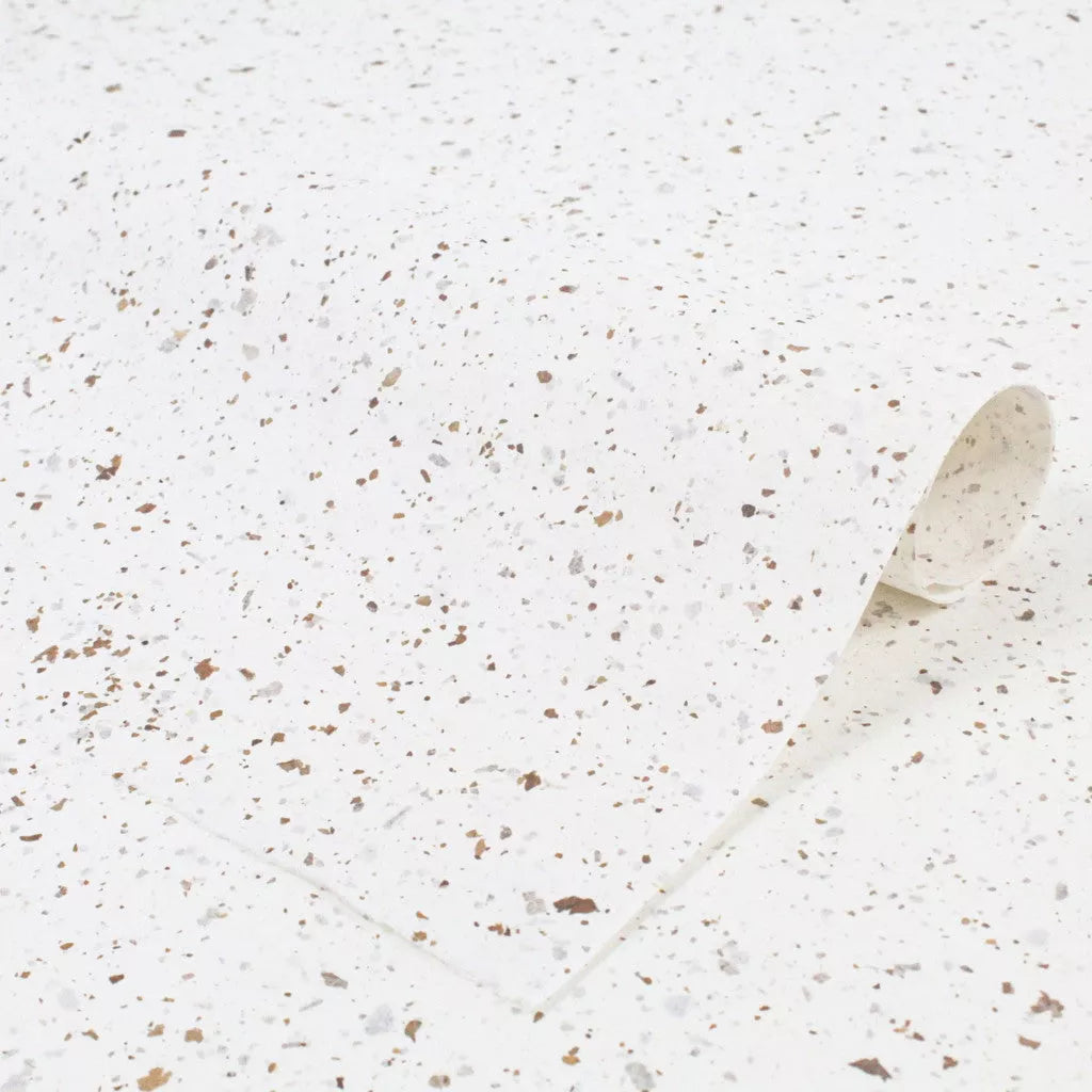 Kozo Studio’s Tobac Confetti Kozo paper, a lightweight yet strong mulberry paper with handmade texture and scattered natural leaf details for unique visual appeal.