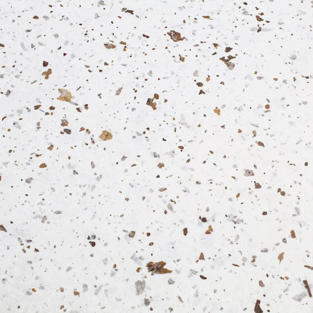 Lightweight and strong mulberry paper from Kozo Studio, featuring gray and brown speckles from Nicotiana leaf confetti, crafted in the style of handmade paper.