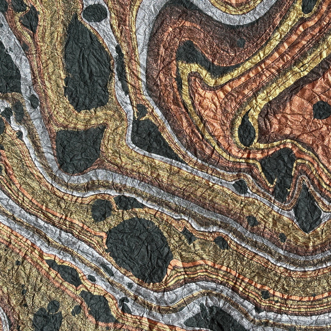 Milano Kozo Paper – Design 9 (Green) embodies artisanal beauty with its graceful marbled design. Handmade by delicately layering mulberry paper over swirling oil-based colors, each sheet boasts a distinct, one-of-a-kind pattern and a soft, fabric-like crinkled texture. Its sophisticated look and exceptional quality make it ideal for creative projects, detailed crafts, or as a striking decorative statement on its own.