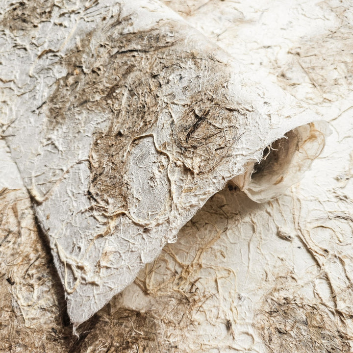 Medium weight Kozo Studio mulberry paper with rich, natural tones and a coarse handmade surface, suited for creative DIY and decorative use.