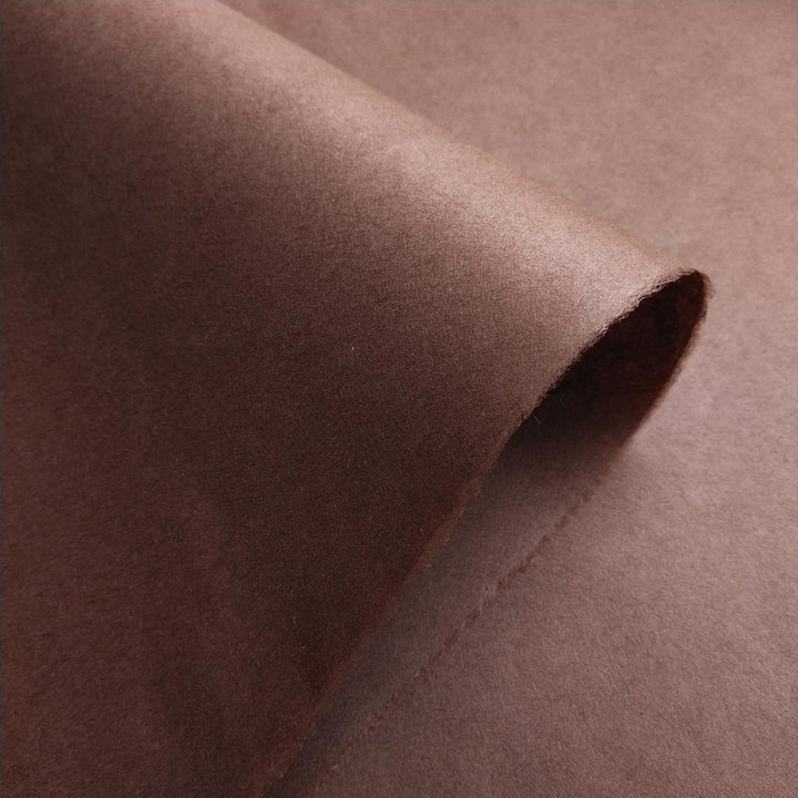 Kozo Studio tawny brown handmade paper featuring a smooth surface, subtle texture, and artisanal quality.